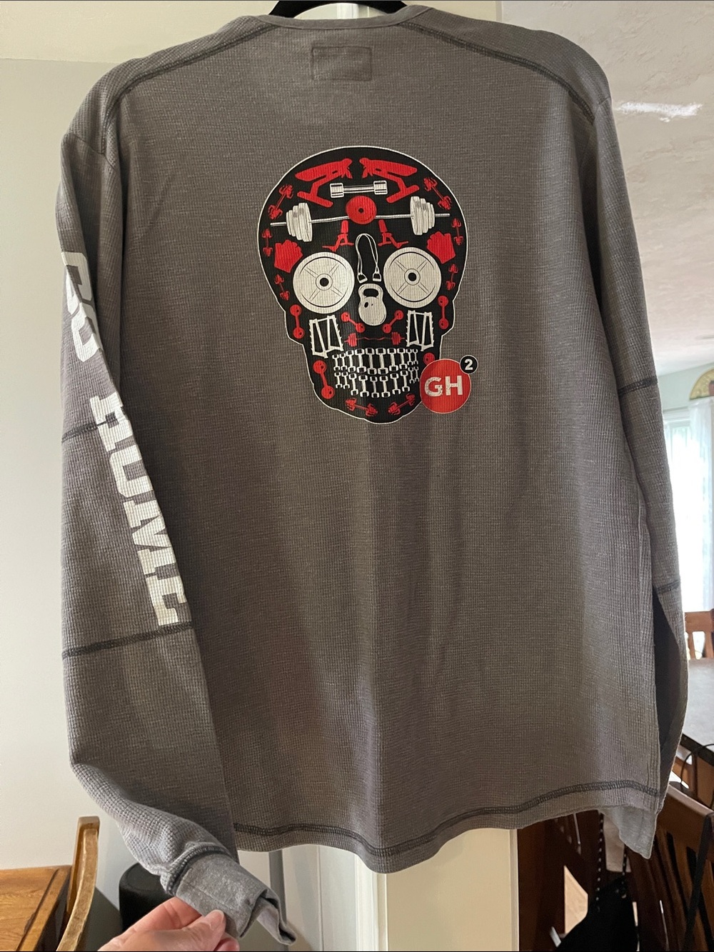 New Era Gray Long Sleeve Tee with Red and White Skull Graphic